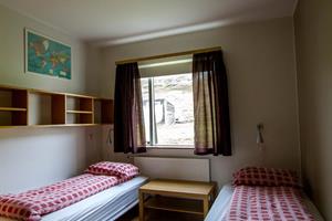 Twin room with shared bathroom