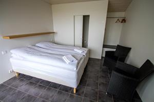 Tveggja manna herbergi með baði