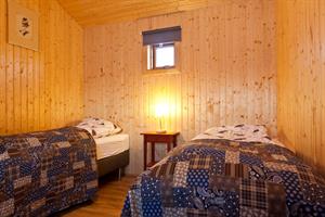 Sunset Cottage - Bedroom with twin beds.