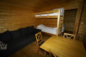 Bjálki - Bunk bed and a sofa bed