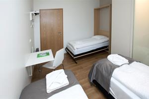 Standard triple room with private bathroom