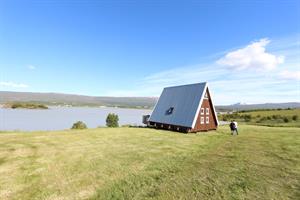 The bigger cottage is with one double room and sofa bed in the living room - ideal for families