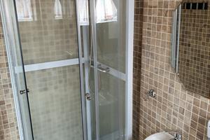 Shower in both apartments