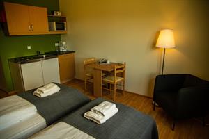 Double/ twin room with private bathroom and kitchenette.