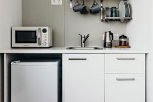 Superior Cottage: Cooking facilities in a 2-4 pers. cottage (37m2) with 1 bedroom and sofa bed in the living room.