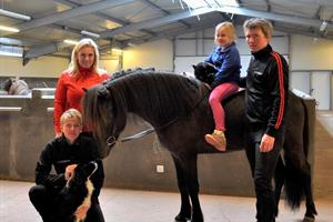 The family at the horse farm.