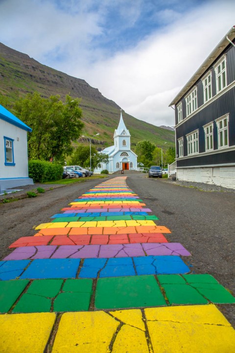 A rainbow street in Seyðisfjörður