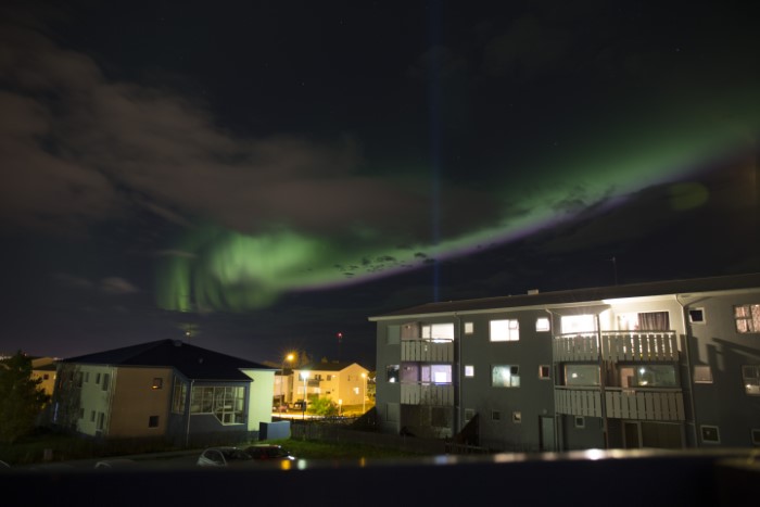Auroras dancing over Reykjavík