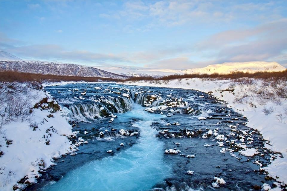 A frozen waterfall in Iceland