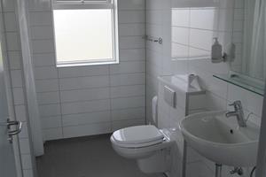 One of three bathrooms