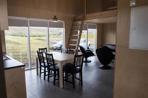 Dining area and sleeping loft of a larger sized cottage