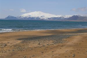 Sandy beach by Guesthouse Langaholt and Snæfellsjökull Glacier