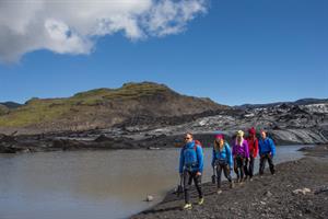 Walking in front of the glacier