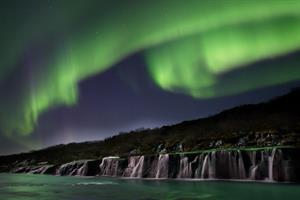 Northern lights at Hraunfossar Waterfalls